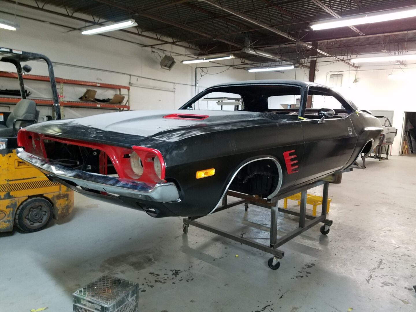 A black 1972 Dodge Challenger Rallye with white coating