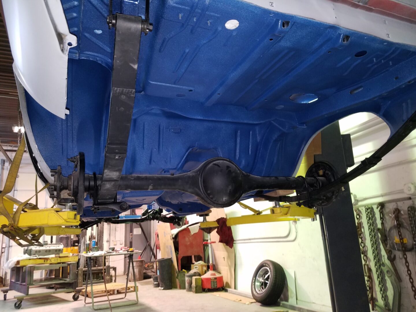 A blue car frame underside