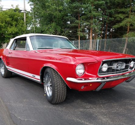 A red car with a white roof