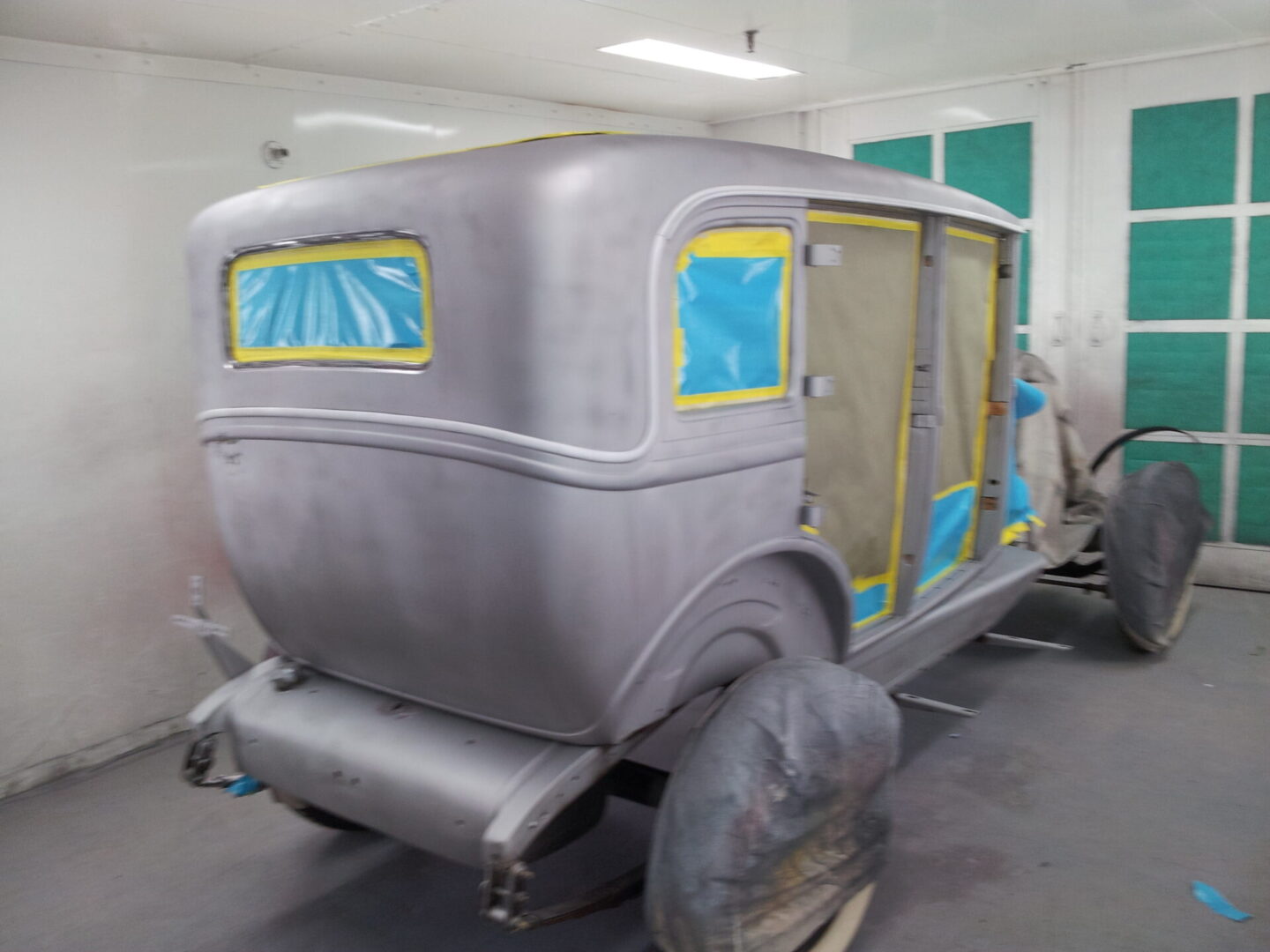 A 1930 Chevrolet covered in wraps