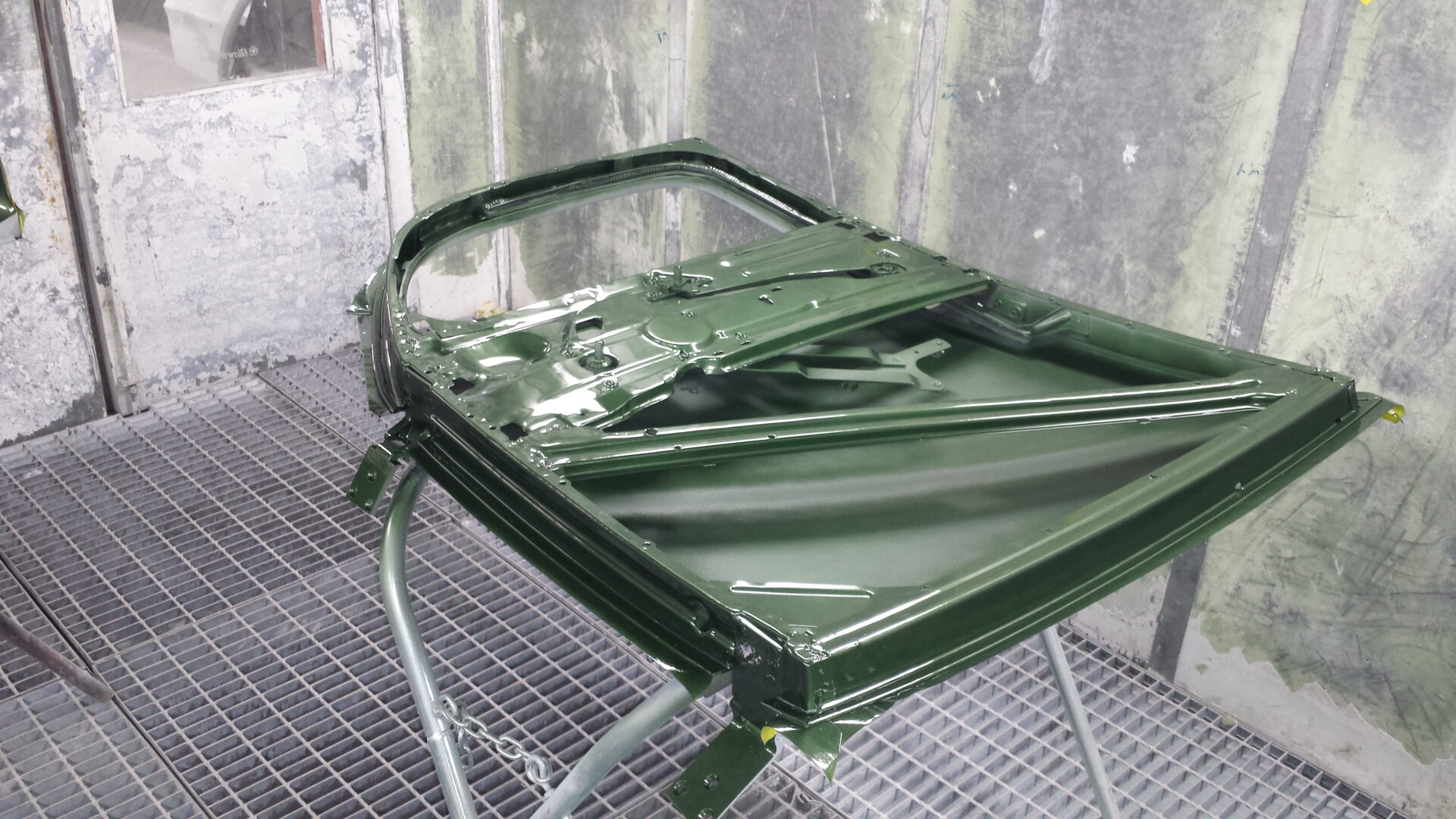 A dark green painted 1940 Ford model door