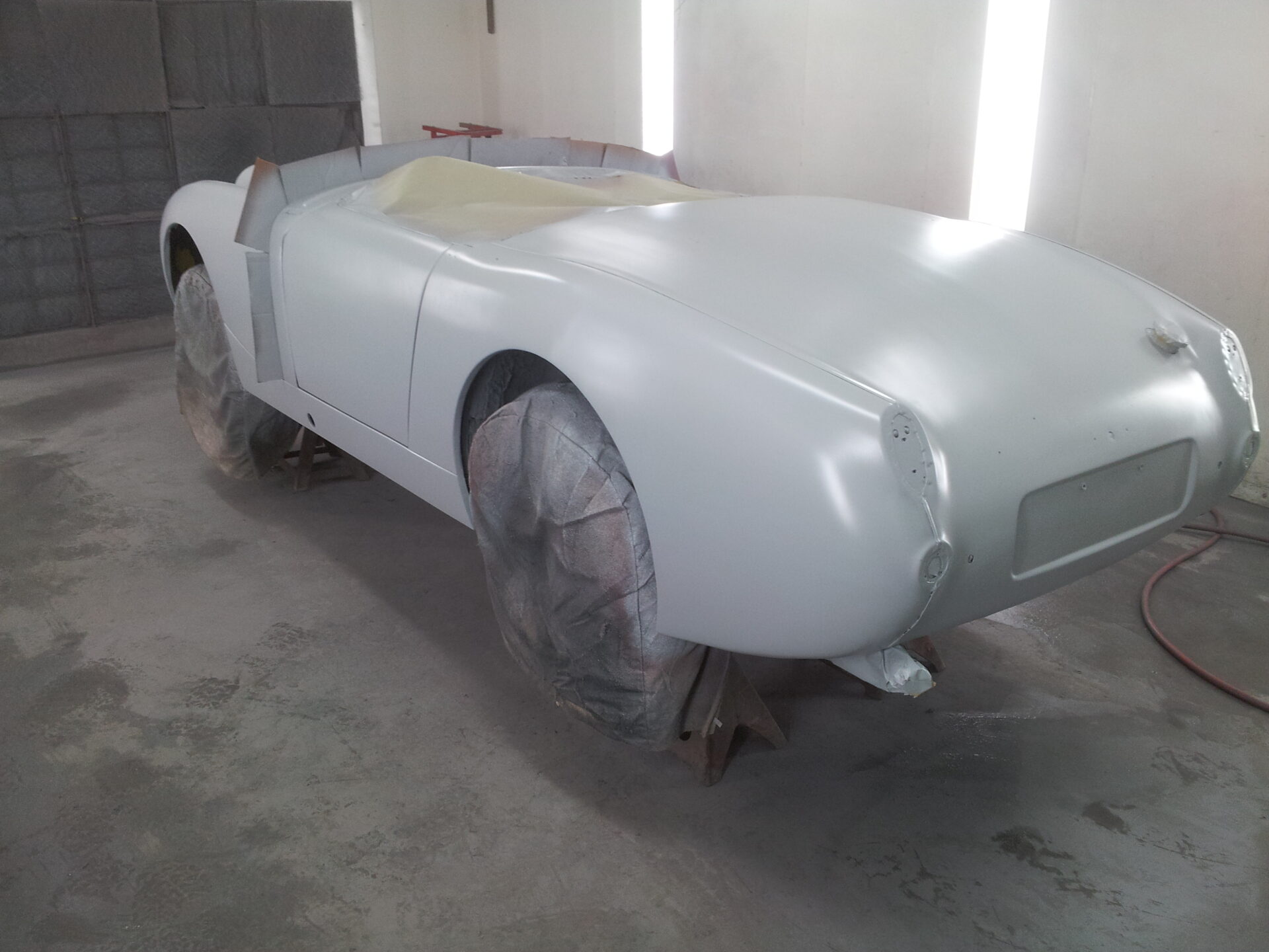 A 1959 Austin Healey coated for paint