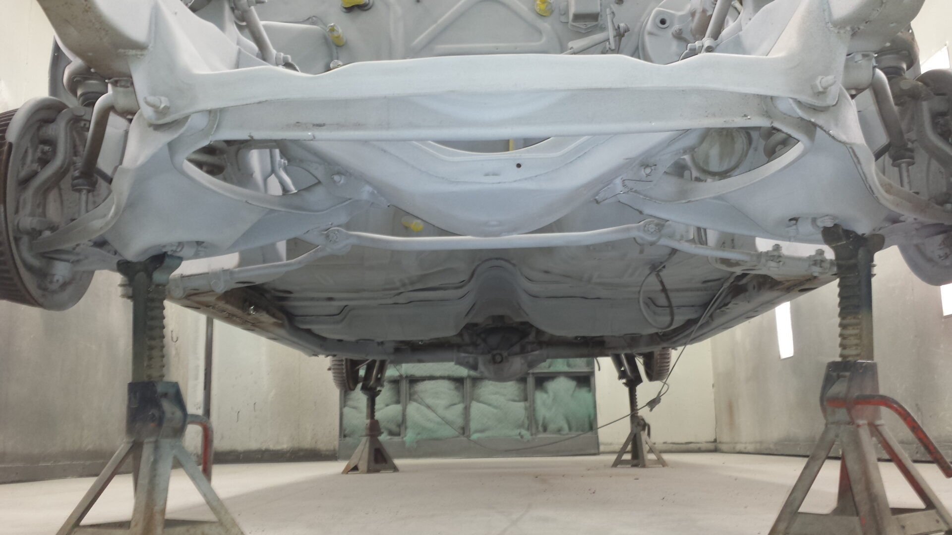 The underside of the 1965 Pontiac Grand Prix coated