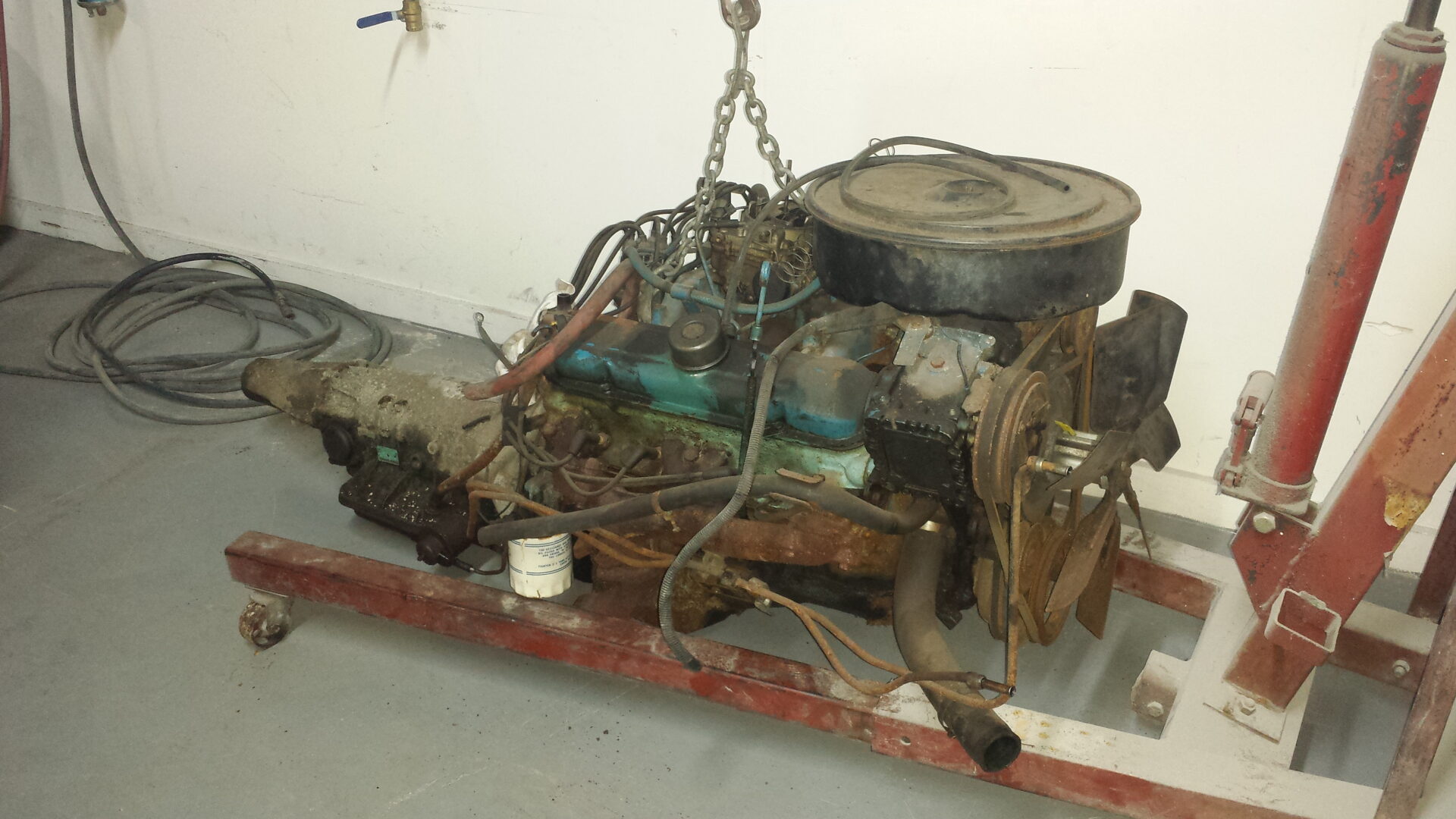 An engine part of the 1965 Pontiac Grand Prix