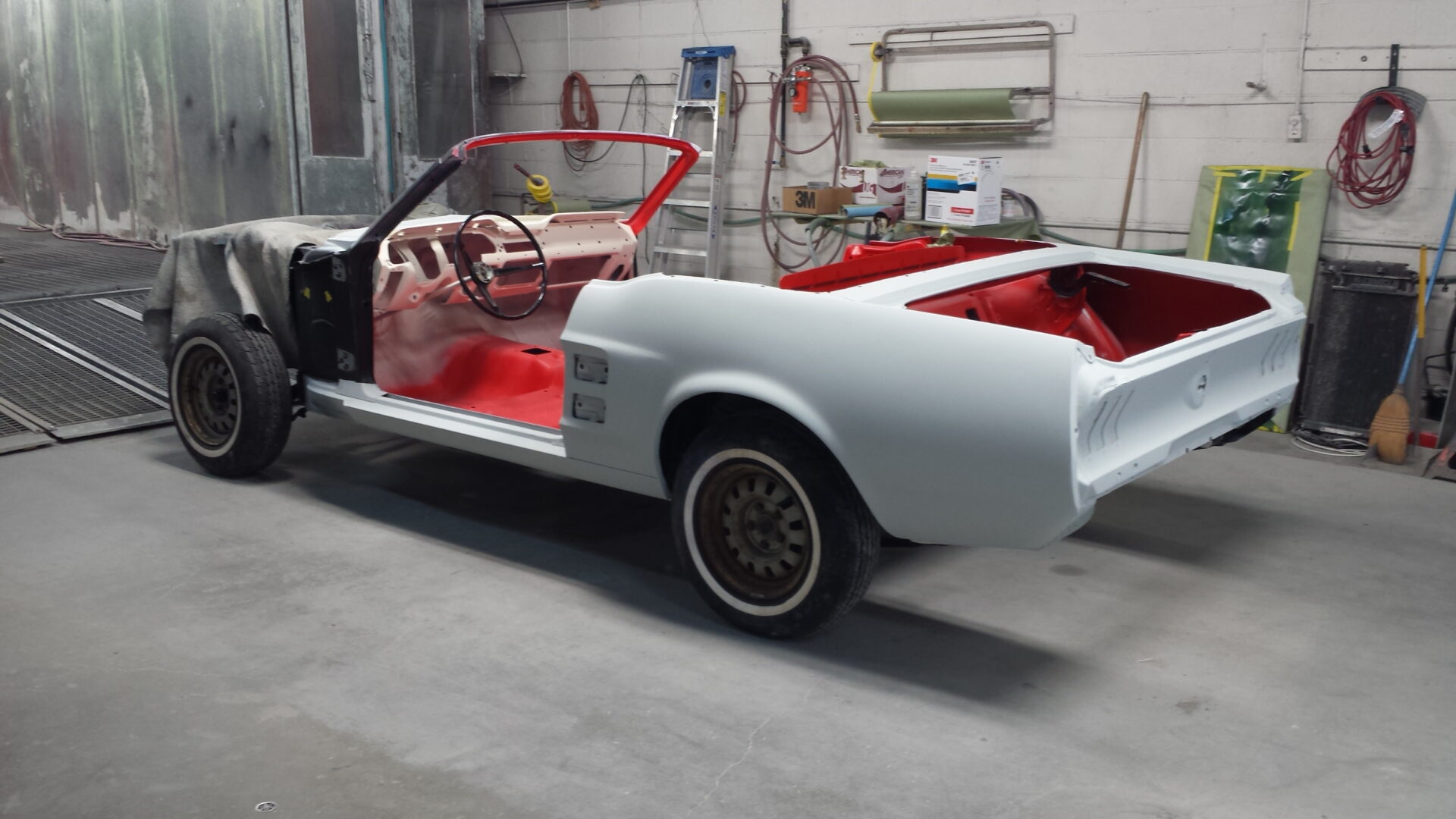 A partially painted 1967 Ford Mustang Convertible