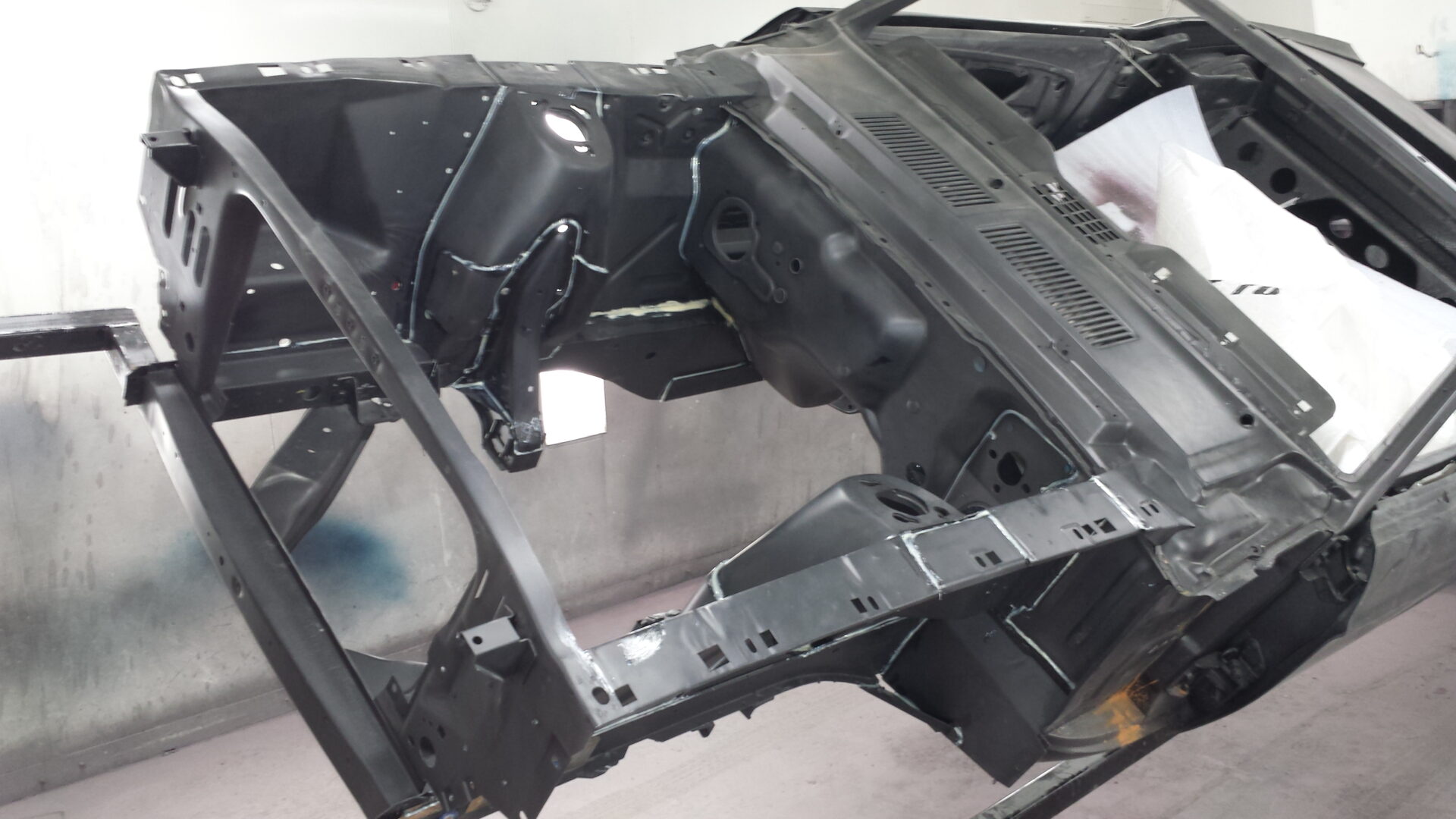 An empty 1967 Ford Mustang Convertible car frame