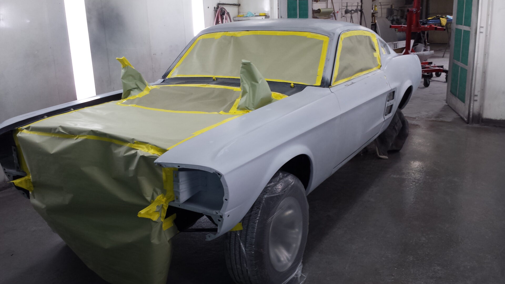 A grey coated 1967 Ford Mustang Fastback for paint job