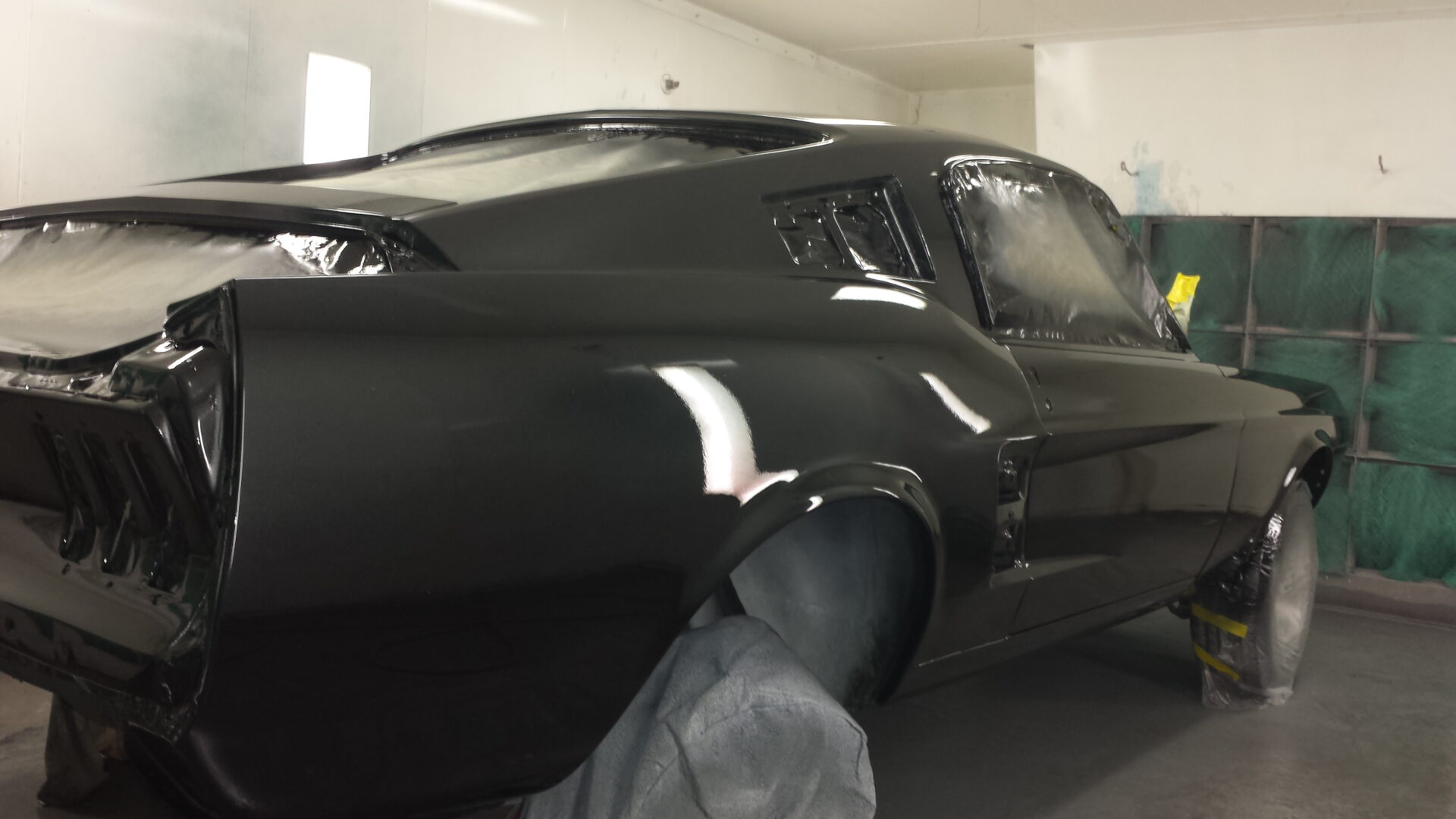 A newly painted black 1967 Ford Mustang Fastback