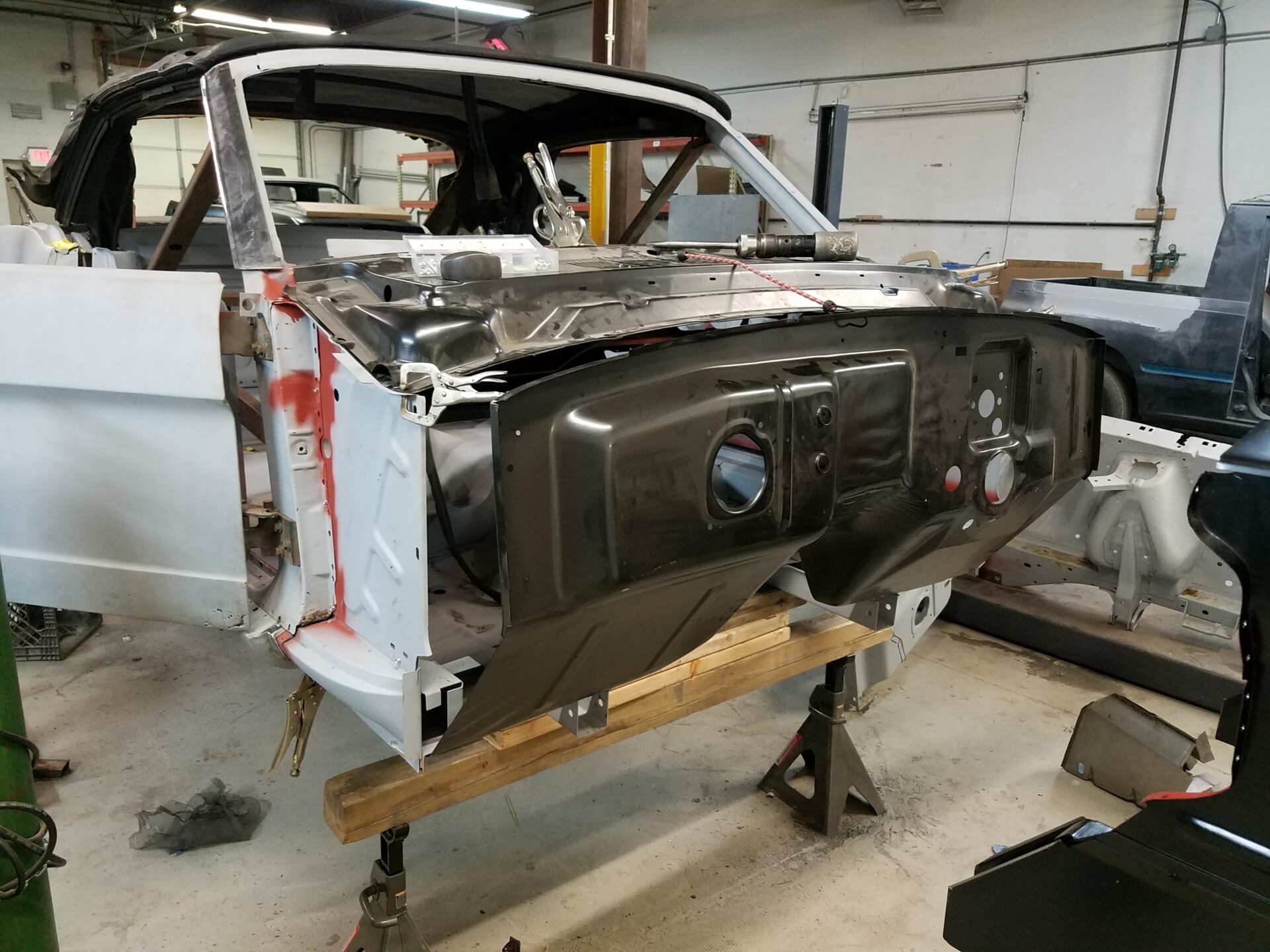 Attatching new parts to the 1966 Ford Mustang Convertible