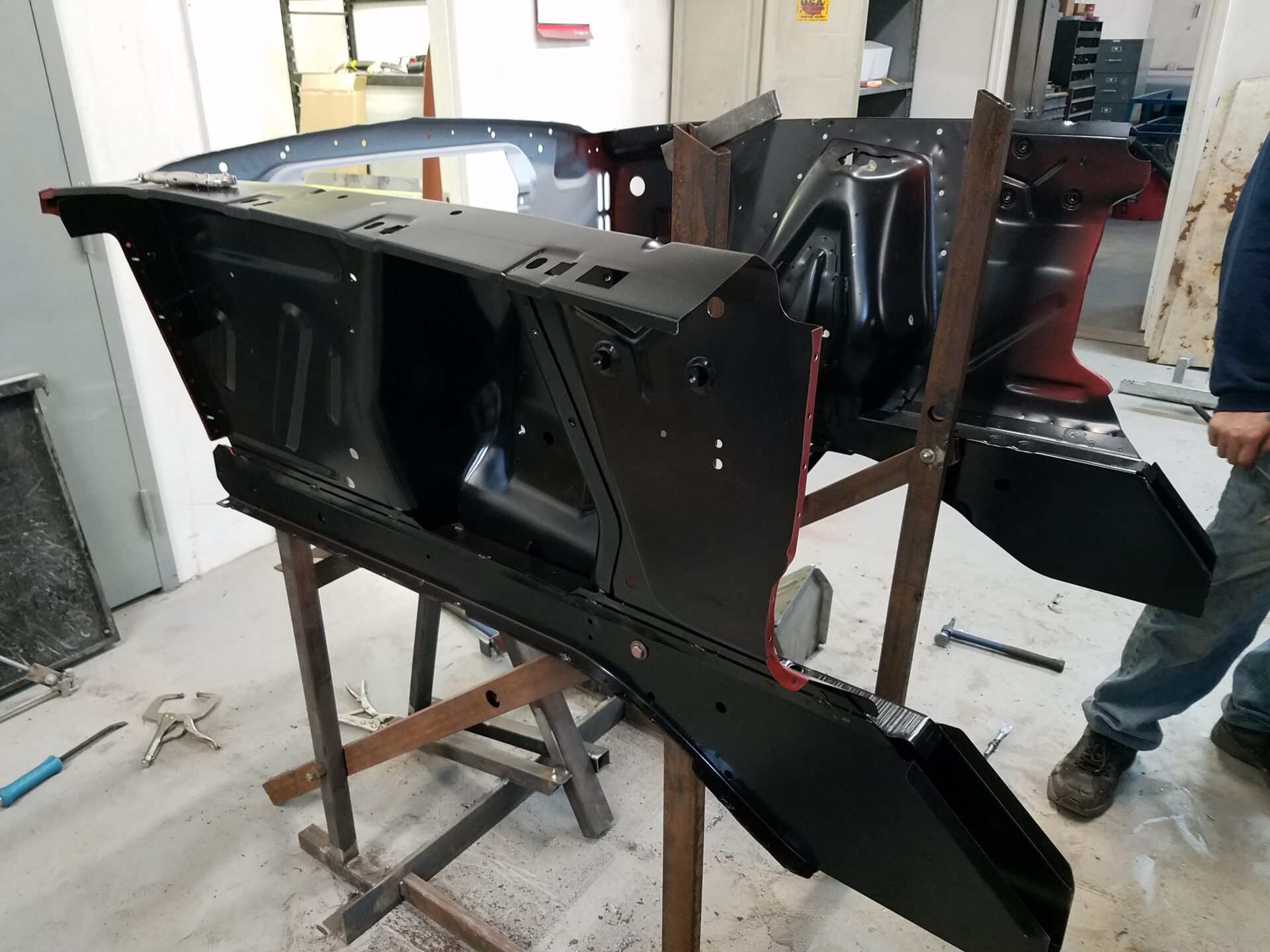 A newly painted 1966 Ford Mustang Convertible part