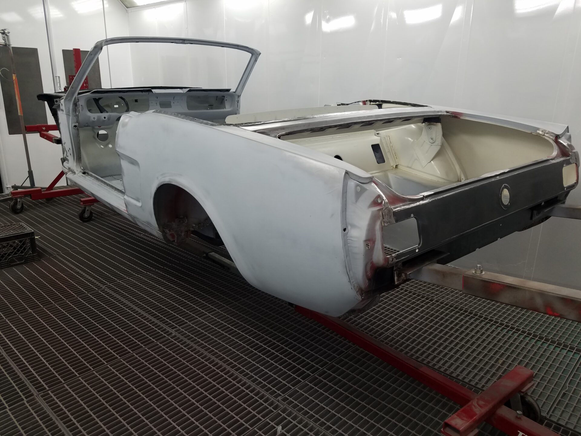 A 1966 Ford Mustang Convertible frame going for a paint job