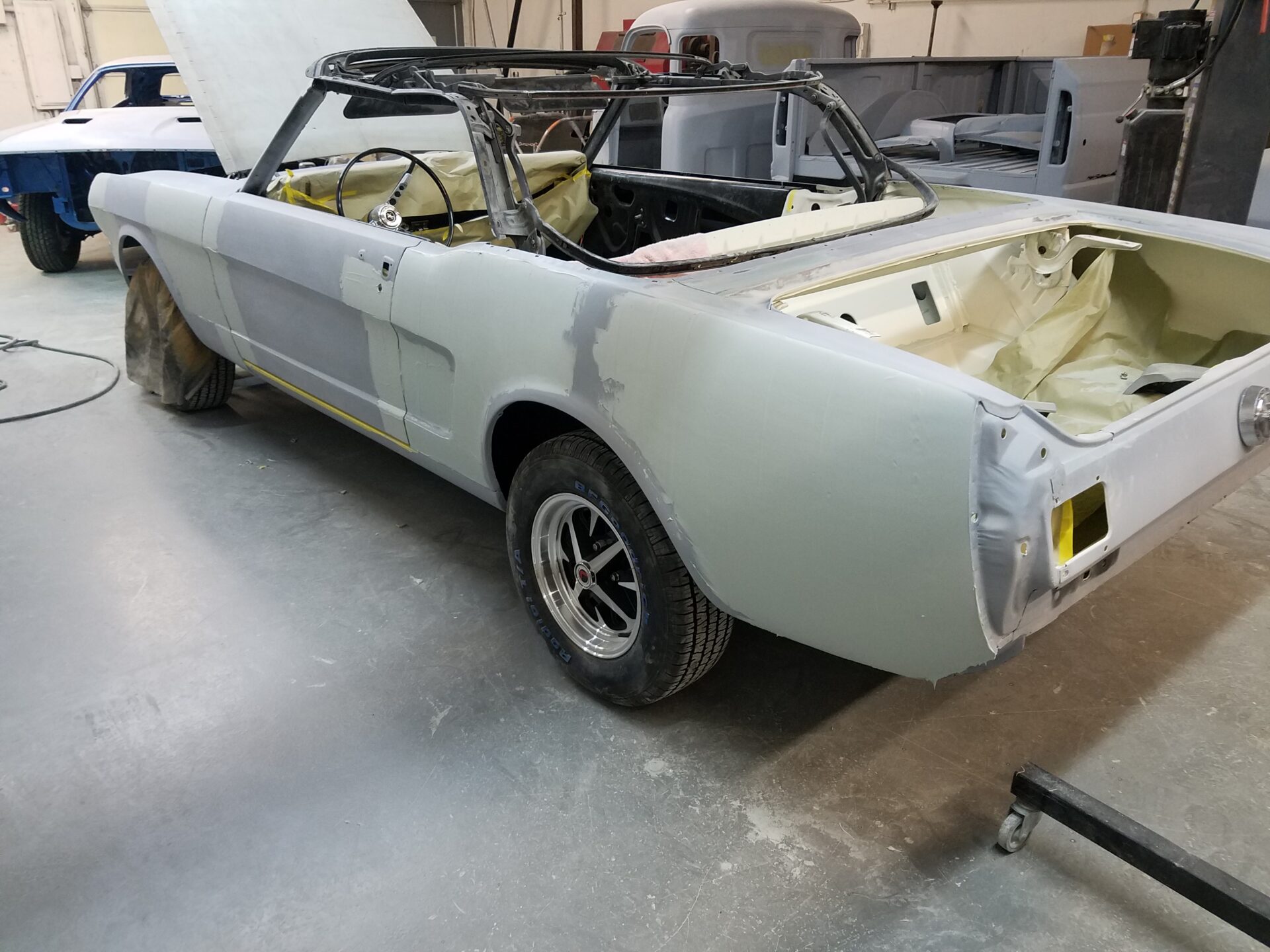 A partially painted 1966 Ford Mustang Convertible