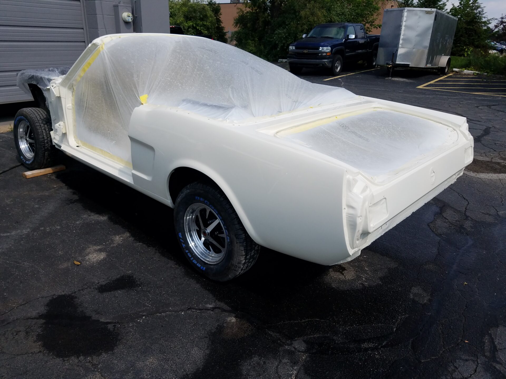 A 1966 Ford Mustang Convertible painted in white