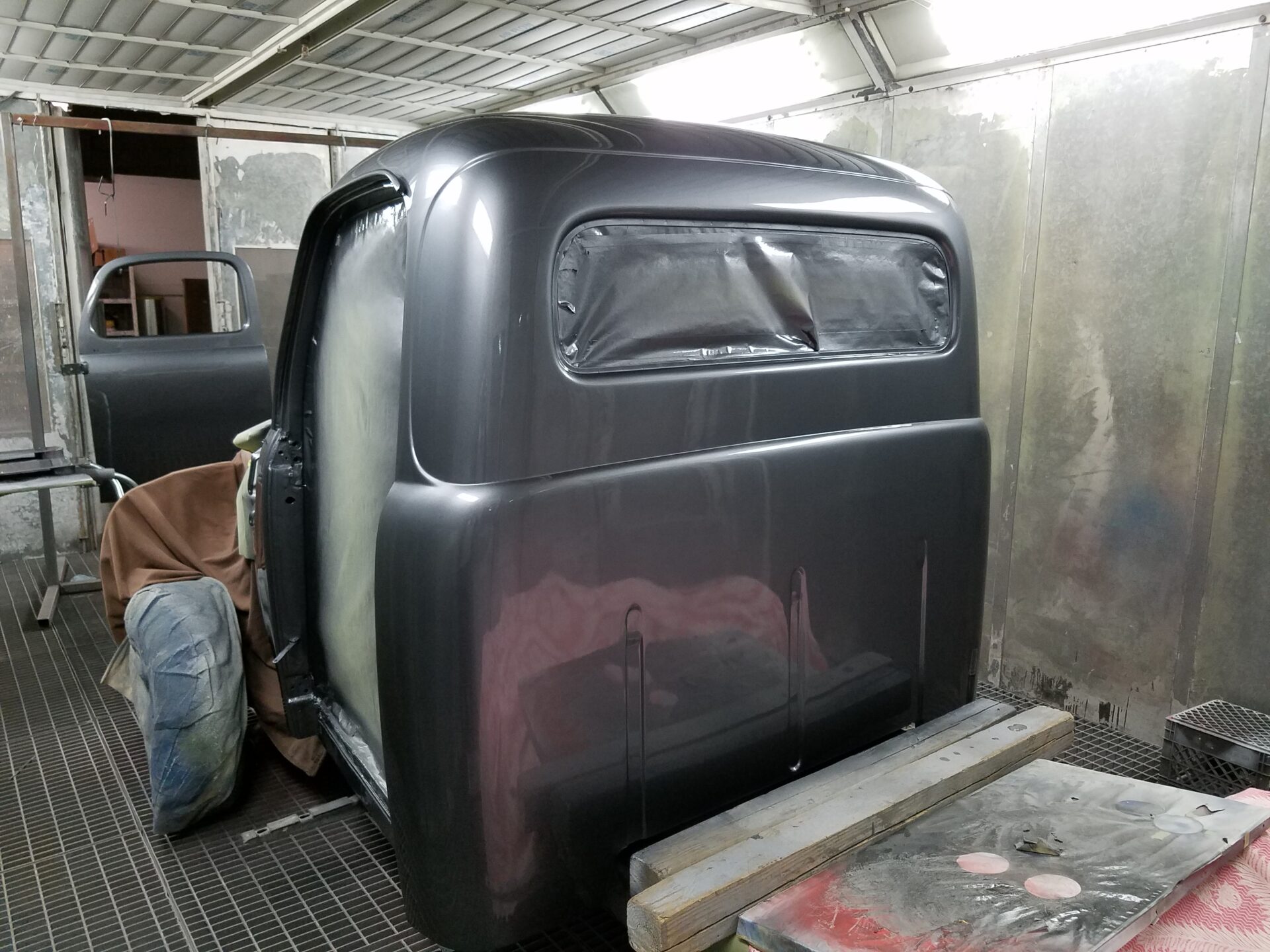 A black painted 1952 Ford F100 body part