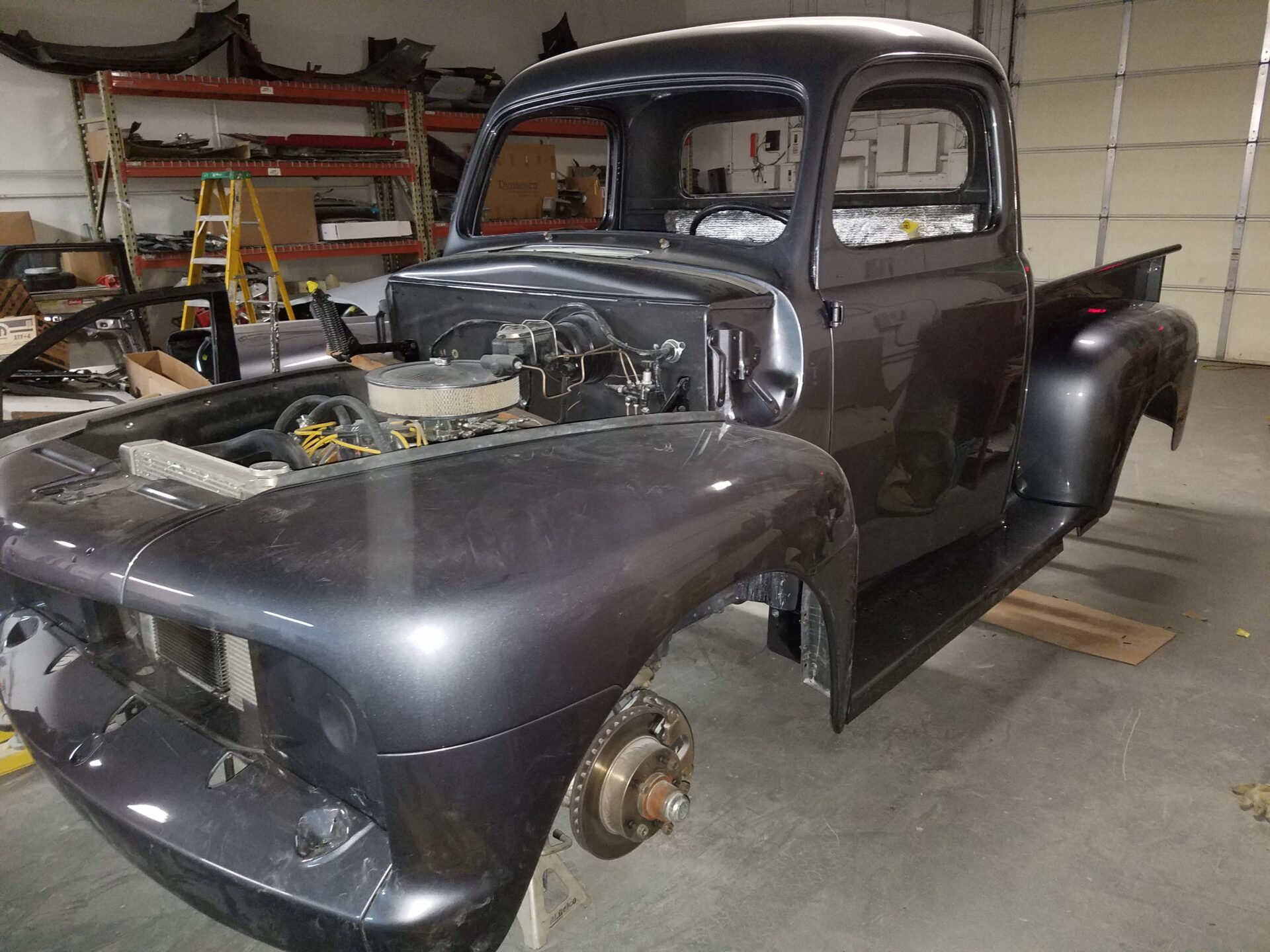 A closer look at the open hood of the 1952 Ford F100