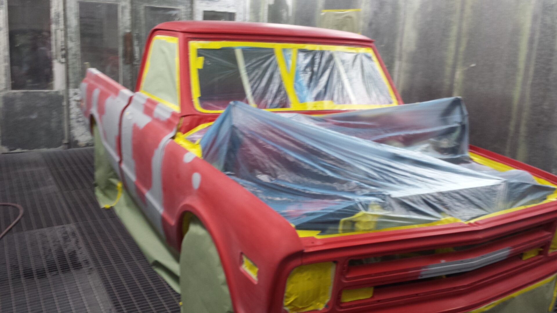 A 1968 Chevy C10 undergoing a paint job