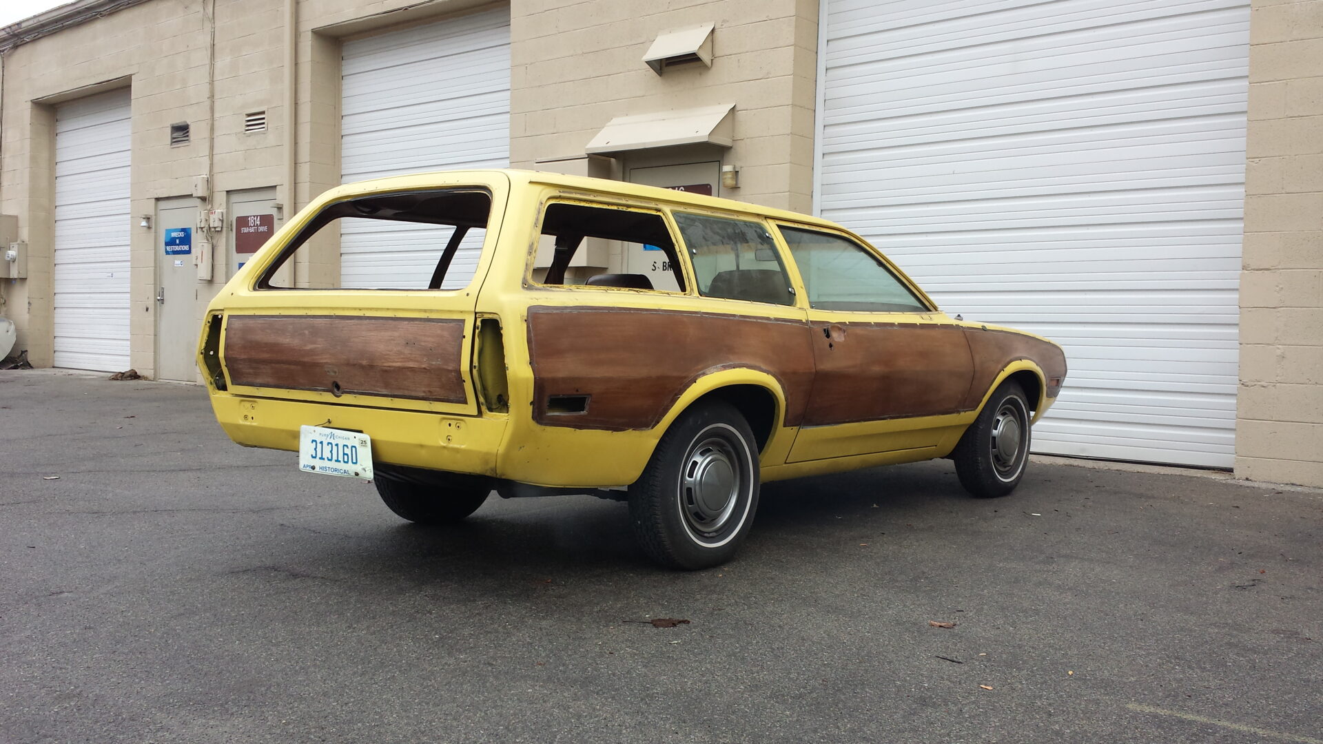 A worn down 1972 Ford Pinto