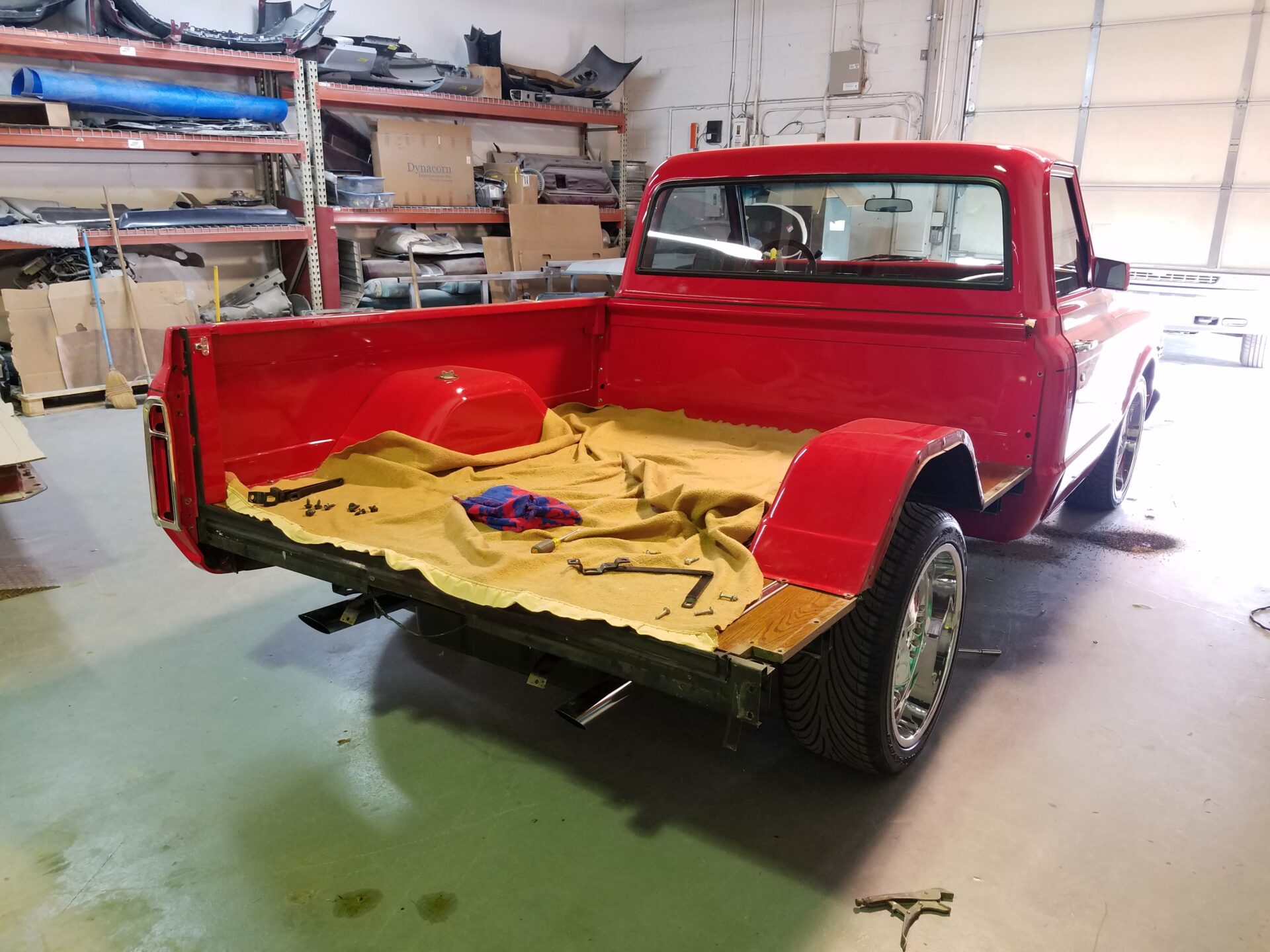 Removing the damaged 1968 Chevy C10 part