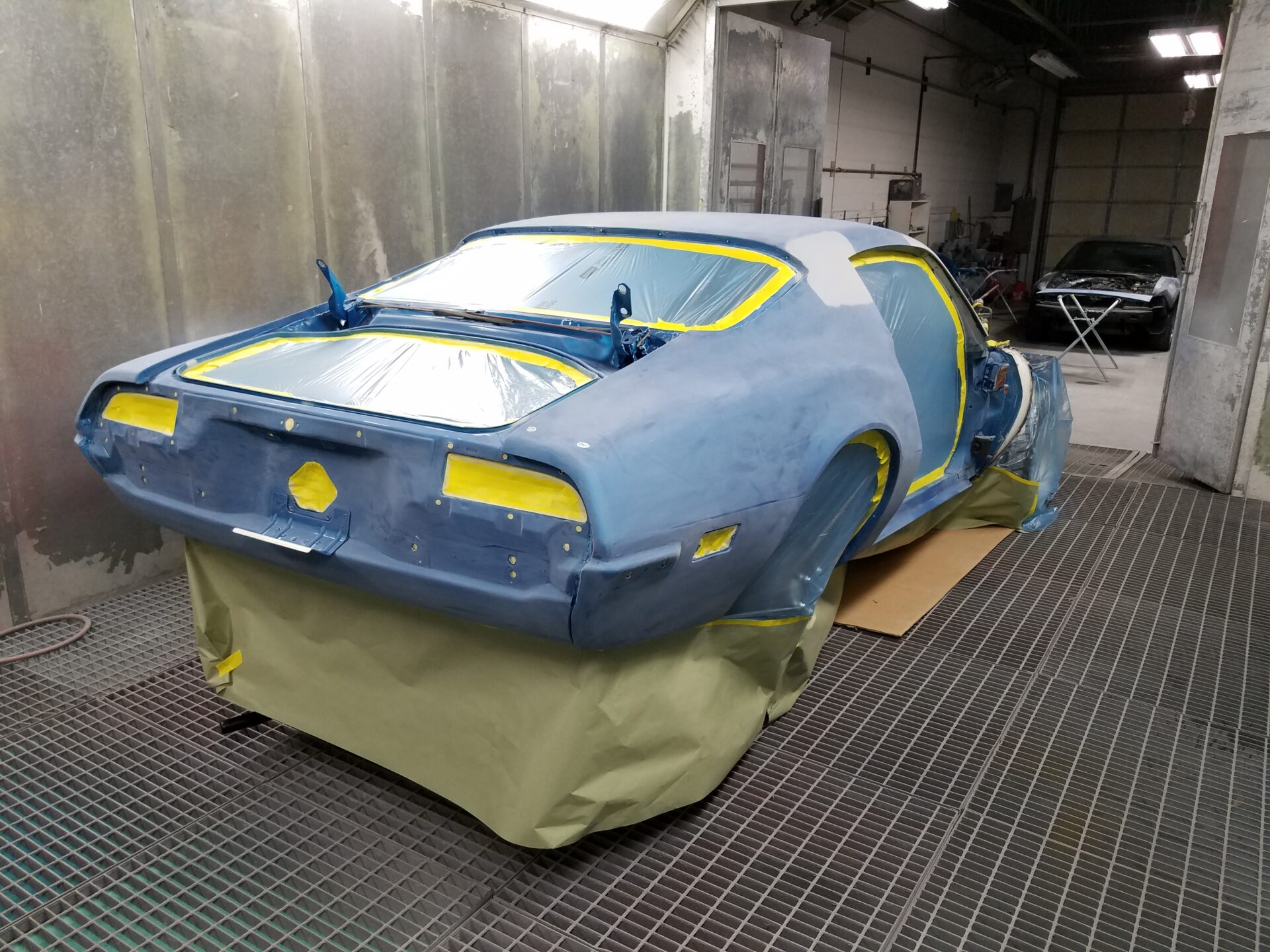 A 1971 Pontiac Trans Am receiving paint job