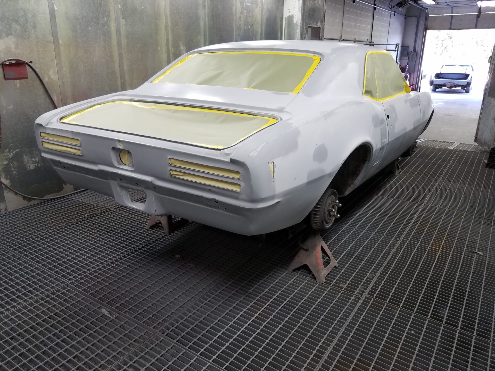A rear view of the 1968 Pontiac Firebird without wheels