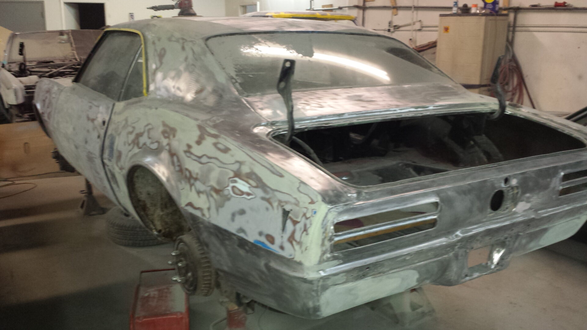 A 1968 Pontiac Firebird undergoing restoration